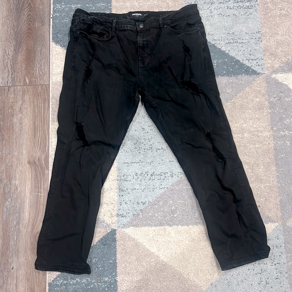 Black distressed RSQ jeans with a slim tapper fit, nice fit, and great martial!